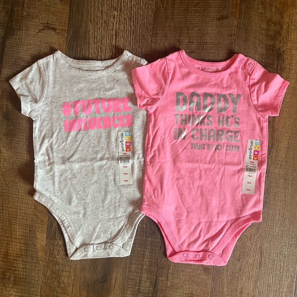 2 Garanimals baby girl onesies. New with tags. Baby Size 18 months.